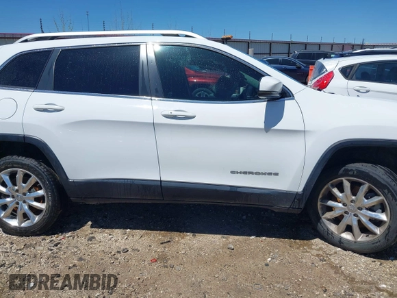 2014 Jeep Cherokee Limited with VIN 1C4PJLDS9EW163565, listed as a IAAI auction lot 42033048 with 183,048 mi miles. Bid and sale history available at carsss.com. Image 13.