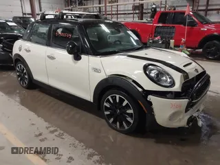 2019 MINI Hardtop 4 Door Cooper S with VIN WMWXU3C5XK2H88000, listed as a IAAI auction lot 41903504 with 60,245 mi miles and . Bid and sale history available at DreamBid. Image 1.