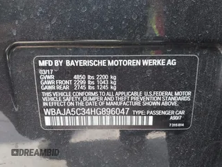 2017 BMW 5 Series 530i with VIN WBAJA5C34HG896047, listed as a IAAI auction lot 41441337 with 83,213 mi miles and . Bid and sale history available at carsss.com. Image 9.