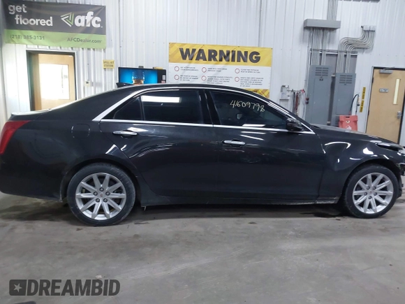 2015 Cadillac CTS Performance AWD with VIN 1G6AY5S30F0109507, listed as a IAAI auction lot 41609798 with 84,846 mi miles and . Bid and sale history available at DreamBid. Image 13.