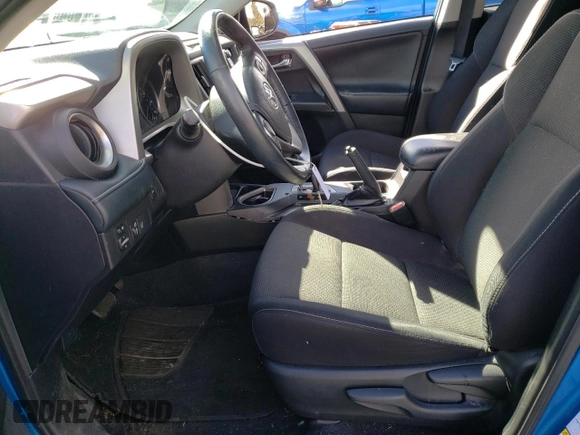 2018 Toyota RAV4 XLE with VIN 2T3RFREV3JW752934, listed as a Copart auction lot 48942015 with 74,182 mi miles and Salvage Title. Bid and sale history available at DreamBid. Image 7.