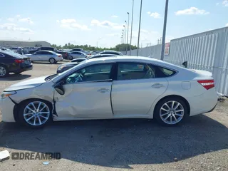 2013 Toyota Avalon XLE z VIN 4T1BK1EB2DU041971, wystawiony jako IAAI lot #42070838 z przebiegiem 89 299 mil mil oraz . Historia ofert i sprzedaży dostępna na DreamBid. Obrazek 14.