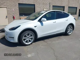 2023 Tesla Model Y Long Range with VIN 7SAYGDEE2PF696336, listed as a IAAI auction lot 41894686 with 34,203 mi miles. Bid and sale history available at carsss.com. Image 2.