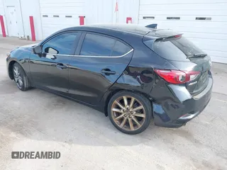 2018 Mazda 3 Touring with VIN 3MZBN1L30JM247097, listed as a IAAI auction lot 41803062 with 61,345 mi miles. Bid and sale history available at carsss.com. Image 3.