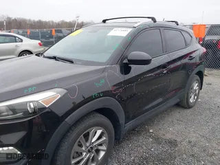2016 Hyundai Tucson SE with VIN KM8J33A4XGU179953, listed as a IAAI auction lot 41771885 with 103,139 mi miles. Bid and sale history available at carsss.com. Image 6.