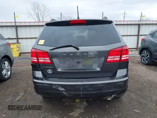2017 Dodge Journey SE with VIN 3C4PDCAB9HT603595, listed as a IAAI auction lot 41914690 with 104,960 mi miles and . Bid and sale history available at DreamBid. Image 16.