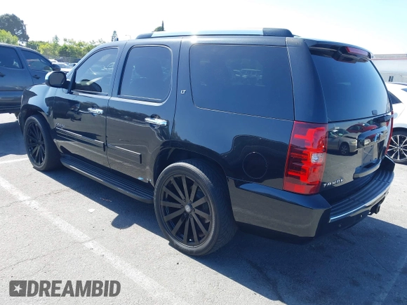 2013 Chevrolet Tahoe LT z VIN 1GNSCBE03DR174545, wystawiony jako IAAI lot #42510886 z przebiegiem 184 627 mil mil oraz . Historia ofert i sprzedaży dostępna na DreamBid. Obrazek 3.