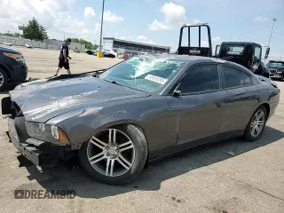 2013 Dodge Charger SE z VIN 2C3CDXBG5DH638254, wystawiony jako Copart lot #58925295 z przebiegiem 201 802 mil mil oraz Szkoda całkowita • Salvage title. Historia ofert i sprzedaży dostępna na DreamBid. Obrazek 13.