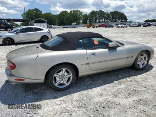 1999 Jaguar XK z VIN SAJGX2049XC034022, wystawiony jako Copart lot #55690025 z przebiegiem Nie podano mil oraz Tytuł czysty. Historia ofert i sprzedaży dostępna na DreamBid. Obrazek 3.