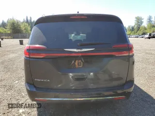 2023 Chrysler Pacifica Touring L with VIN 2C4RC1BG3PR628150, listed as a Copart auction lot 66003805 with 45,870 mi miles and Salvage title. Bid and sale history available at DreamBid. Image 6.