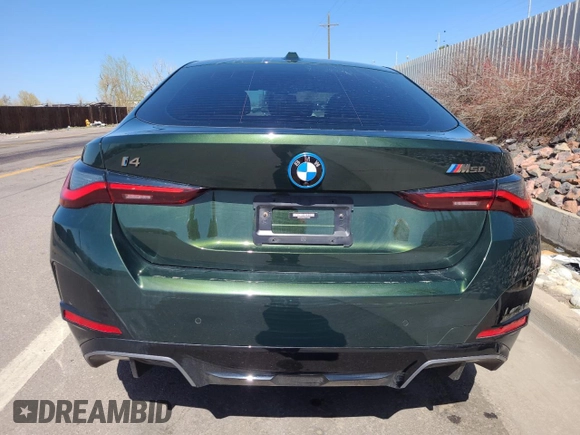 2023 BMW i4 M50 with VIN WBY33AW02PFP23002, listed as a Copart auction lot 48859014 with 7,829 mi miles. Bid and sale history available at carsss.com. Image 6.