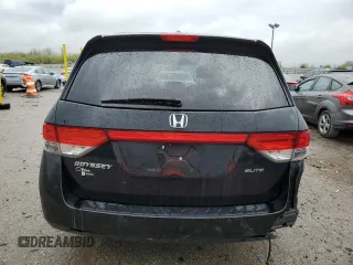 2014 Honda Odyssey Touring z VIN 5FNRL5H91EB063390, wystawiony jako Copart lot #54482545 z przebiegiem Nie podano mil oraz Szkoda całkowita • Salvage title. Historia ofert i sprzedaży dostępna na DreamBid. Obrazek 6.