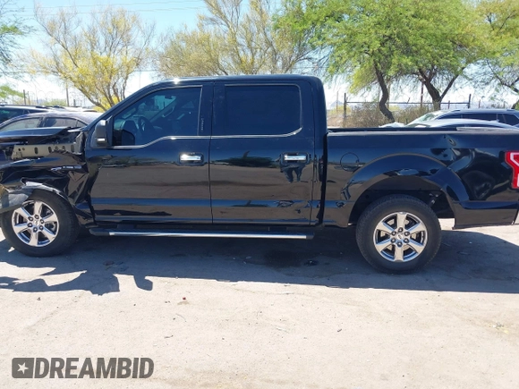 2018 Ford F-150 XL with VIN 1FTEW1C50JKF28600, listed as a IAAI auction lot 42081191 with 105,636 mi miles and . Bid and sale history available at DreamBid. Image 15.