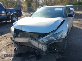 2018 Nissan Maxima SV with VIN 1N4AA6AP7JC375132, listed as a IAAI auction lot 41105988 with 200,877 mi miles and . Bid and sale history available at DreamBid. Image 6.