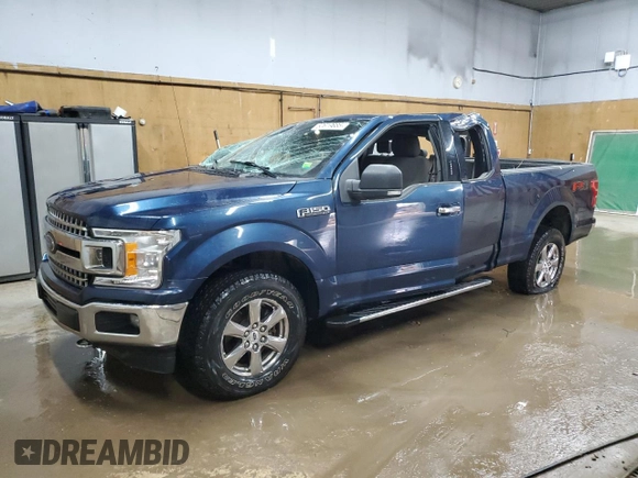 2018 Ford F-150 XL with VIN 1FTFX1E57JFE75983, listed as a Copart auction lot 52619685 with 184,124 mi miles and Clean title. Bid and sale history available at DreamBid. Image 1.