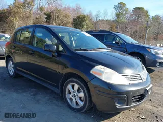 2009 Nissan Versa 1.8 S with VIN 3N1BC13E79L406888, listed as a IAAI auction lot 41573635 with 181,415 mi miles. Bid and sale history available at carsss.com. Image 1.