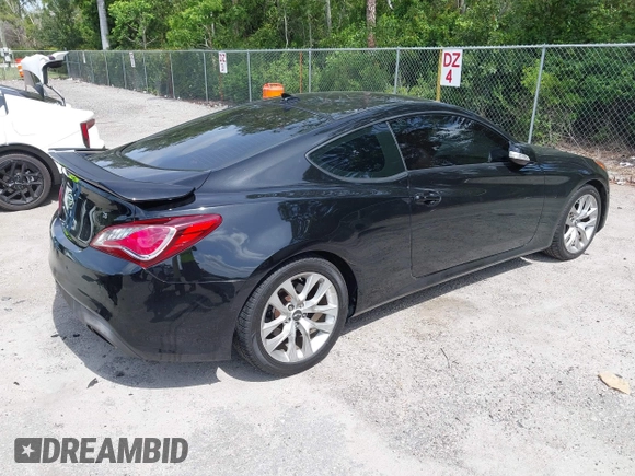 2013 Hyundai Genesis Coupe Grand Touring with VIN KMHHU6KJ4DU084544, listed as a IAAI auction lot 42392452 with 58,916 mi miles and . Bid and sale history available at DreamBid. Image 4.