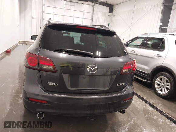 2015 Mazda CX-9 Sport with VIN JM3TB2BA1F0453620, listed as a IAAI auction lot 41330887 with 119,219 mi miles and . Bid and sale history available at carsss.com. Image 16.