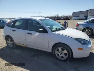 2004 Ford Focus with VIN 3FAFP37Z74R121213, listed as a Copart auction lot 53339645 with 65,590 mi miles and Clean title. Bid and sale history available at DreamBid. Image 4.