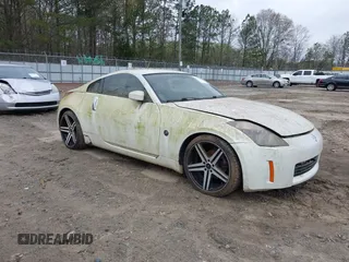 2003 Nissan 350Z Enthusiast with VIN JN1AZ34D53T104658, listed as a IAAI auction lot 41876079 with 257,634 mi miles. Bid and sale history available at carsss.com. Image 1.