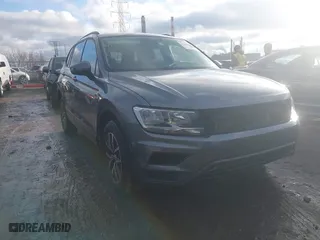 2021 Volkswagen Tiguan S with VIN 3VV1B7AX9MM075450, listed as a IAAI auction lot 41509295 with 69,097 mi miles. Bid and sale history available at carsss.com. Image 1.
