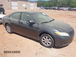 2007 Toyota Camry CE with VIN 4T1BE46K47U665377, listed as a IAAI auction lot 42133285 with 157,396 mi miles. Bid and sale history available at carsss.com. Image 1.