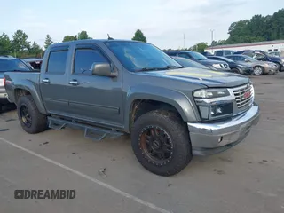 2012 GMC Canyon SLE1 with VIN 1GTH6MFE4C8128579, listed as a IAAI auction lot 42750181 with 250,960 mi miles and . Bid and sale history available at DreamBid. Image 1.