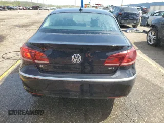 2015 Volkswagen CC Sport z VIN WVWBP7AN8FE804114, wystawiony jako Copart lot #54880245 z przebiegiem 124 639 mil mil oraz Tytuł czysty. Historia ofert i sprzedaży dostępna na DreamBid. Obrazek 6.