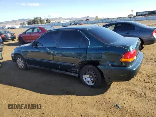 1996 Honda Civic z VIN 1HGEJ6507TL021317, wystawiony jako Copart lot #80767574 z przebiegiem 227 670 mil mil oraz Szkoda całkowita • Salvage title. Historia ofert i sprzedaży dostępna na DreamBid. Obrazek 2.