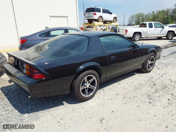 1984 Chevrolet Camaro Z28 Sport with VIN 1G1AP87G2EN157940, listed as a IAAI auction lot 41650616 with 83,804 mi miles. Bid and sale history available at carsss.com. Image 4.