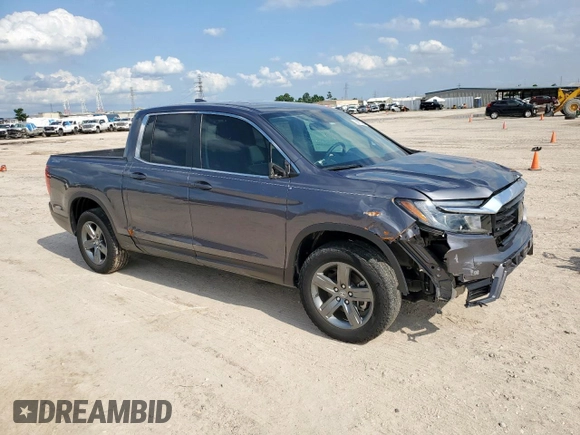 2023 Honda Ridgeline RTL z VIN 5FPYK3F54PB043289, wystawiony jako Copart lot #59173065 z przebiegiem 34 219 mil mil oraz Szkoda całkowita • Salvage title. Historia ofert i sprzedaży dostępna na DreamBid. Obrazek 4.