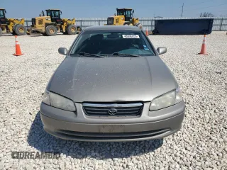 2000 Toyota Camry CE z VIN 4T1BG22K3YU009533, wystawiony jako Copart lot #48996855 z przebiegiem 132 705 mil mil oraz Szkoda całkowita • Salvage title. Historia ofert i sprzedaży dostępna na DreamBid. Obrazek 5.