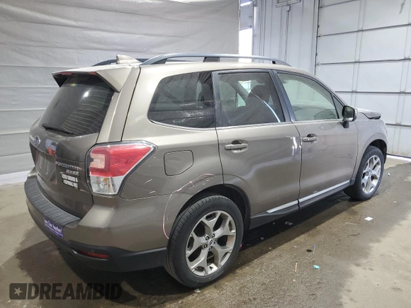 2017 Subaru Forester Touring с VIN JF2SJAWC0HH485803, выставлен на аукционе Copart как лот 55204015 с пробегом 107 337 миль миль и Списание • Salvage title. История ставок и продаж доступна на DreamBid. Изображение 3.