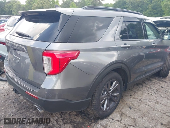 2022 Ford Explorer XLT z VIN 1FMSK7DH8NGB12227, wystawiony jako IAAI lot #42171362 z przebiegiem 7 543 mil mil oraz . Historia ofert i sprzedaży dostępna na DreamBid. Obrazek 4.