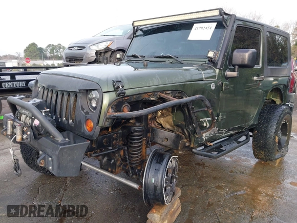 2009 Jeep Wrangler Rubicon z VIN 1J8GA64169L743008, wystawiony jako IAAI lot #41792451 z przebiegiem 142 414 mil mil oraz . Historia ofert i sprzedaży dostępna na DreamBid. Obrazek 6.