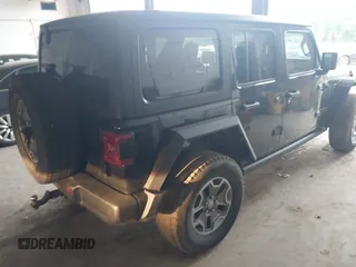 2021 Jeep Wrangler Unlimited Rubicon with VIN 1C4HJXFN2MW587168, listed as a IAAI auction lot 42472309 with 66,272 mi miles and . Bid and sale history available at DreamBid. Image 4.