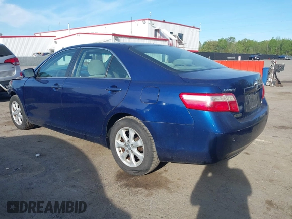 2009 Toyota Camry with VIN 4T1BE46K59U415794, listed as a IAAI auction lot 42048872 with 142,200 mi miles. Bid and sale history available at carsss.com. Image 3.