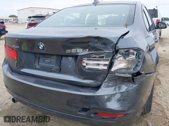 2014 BMW 3 Series 328d xDrive with VIN WBA3D5C59EKX96701, listed as a IAAI auction lot 40716972 with 163,775 mi miles. Bid and sale history available at carsss.com. Image 6.