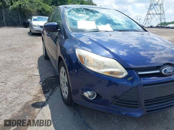 2012 Ford Focus SE z VIN 1FAHP3F22CL157417, wystawiony jako IAAI lot #42655527 z przebiegiem 107 472 mil mil oraz . Historia ofert i sprzedaży dostępna na DreamBid. Obrazek 6.