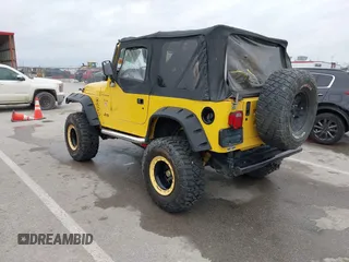 2000 Jeep Wrangler SE with VIN 1J4FA29P5YP705215, listed as a IAAI auction lot 41920532 with 92,927 mi miles and . Bid and sale history available at DreamBid. Image 3.