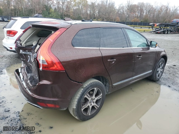 2015 Volvo XC60 T6 Drive-E with VIN YV449MDK4F2664550, listed as a Copart auction lot 82376764 with 128,594 mi miles and Salvage Title. Bid and sale history available at carsss.com. Image 3.
