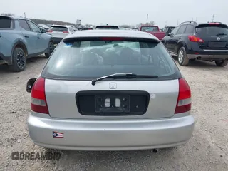 2000 Honda Civic DX z VIN 2HGEJ644XYH104197, wystawiony jako IAAI lot #42005938 z przebiegiem 125 321 mil mil oraz . Historia ofert i sprzedaży dostępna na DreamBid. Obrazek 17.