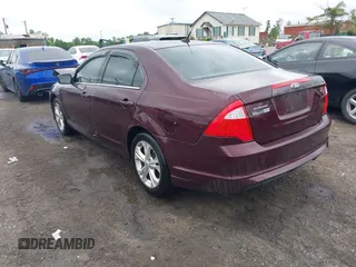 2012 Ford Fusion SE z VIN 3FAHP0HA4CR429812, wystawiony jako IAAI lot #42217492 z przebiegiem 207 215 mil mil oraz . Historia ofert i sprzedaży dostępna na DreamBid. Obrazek 3.