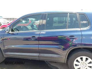 2013 Volkswagen Tiguan with VIN WVGCV3AX6DW605876, listed as a IAAI auction lot 42431619 with 106,279 mi miles and . Bid and sale history available at DreamBid. Image 14.