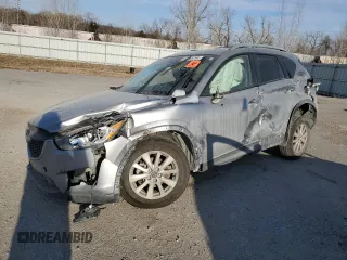 2014 Mazda CX-5 Touring with VIN JM3KE4CY1E0426409, listed as a Copart auction lot 84185294 with 0 mi miles and Salvage Title. Bid and sale history available at carsss.com. Image 1.