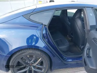 2023 Tesla Model S with VIN 5YJSA1E53PF518986, listed as a IAAI auction lot 41223046 with 22,204 mi miles and . Bid and sale history available at DreamBid. Image 8.