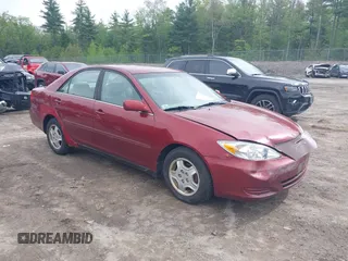 2003 Toyota Camry LE z VIN 4T1BF32K63U050174, wystawiony jako IAAI lot #42260843 z przebiegiem 210 486 mil mil oraz . Historia ofert i sprzedaży dostępna na DreamBid. Obrazek 1.