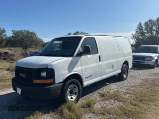 2003 GMC Savana Cargo z VIN 1GTHG35U431113170, wystawiony jako Copart lot #88987945 z przebiegiem 293 807 mil mil oraz Tytuł czysty. Historia ofert i sprzedaży dostępna na DreamBid. Obrazek 2.