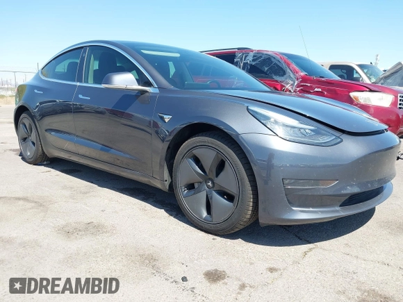 2019 Tesla Model 3 Long Range with VIN 5YJ3E1EB9KF386047, listed as a IAAI auction lot 42215362 with 41,246 mi miles and . Bid and sale history available at DreamBid. Image 1.