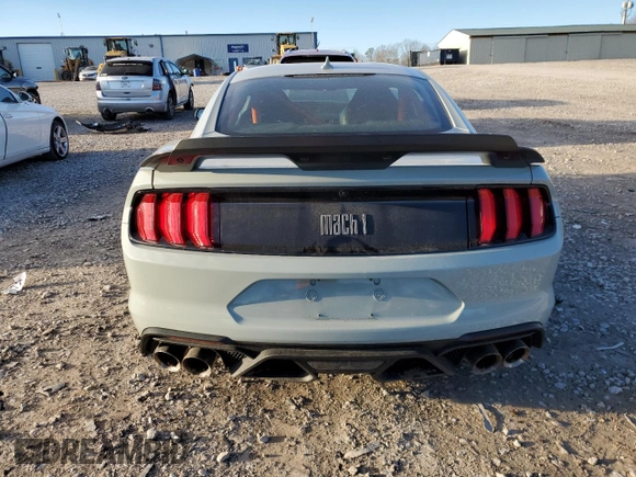 2021 Ford Mustang Mach 1 with VIN 1FA6P8R06M5551345, listed as a Copart auction lot 86491604 with 7,374 mi miles and Salvage Title. Bid and sale history available at carsss.com. Image 6.